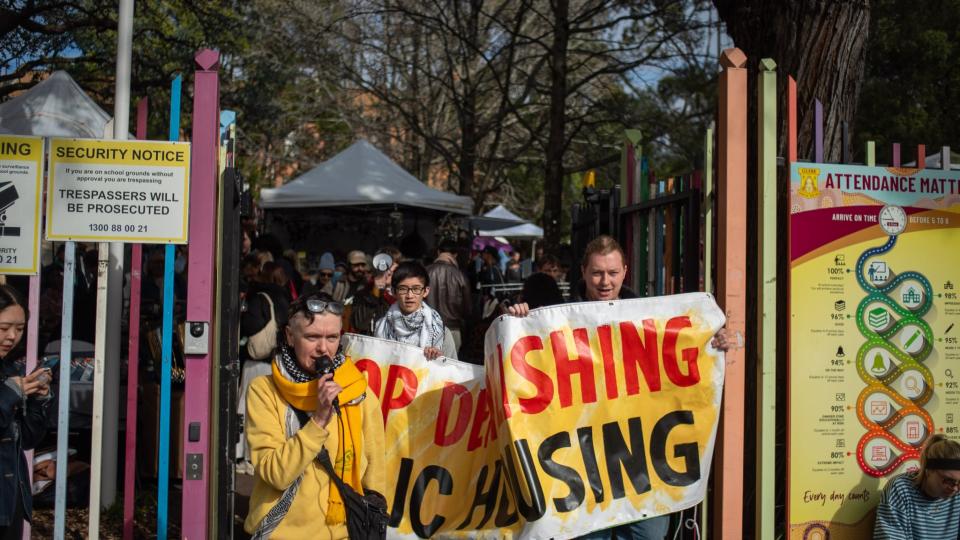 Rachel Evans and Isaac Nellist campaigning against public housing demolitions in Glebe