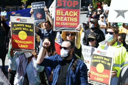 Socialist Alliance members marching against racism in Magan-djin/Brisbane, August 31